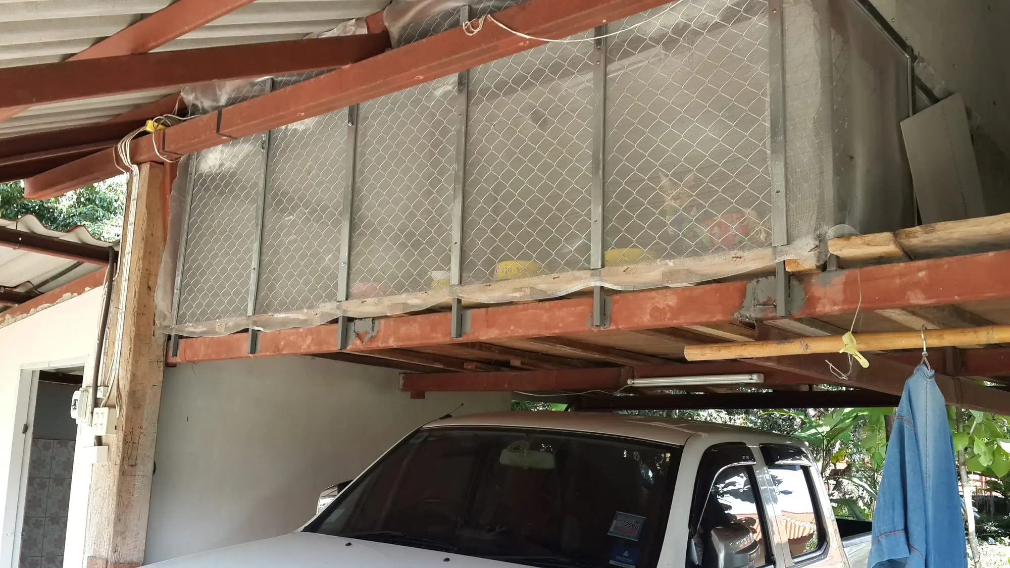 The small cage above the carport where the family was isolated